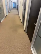 Open office area with clean carpet in a Dallas-Fort Worth workplace