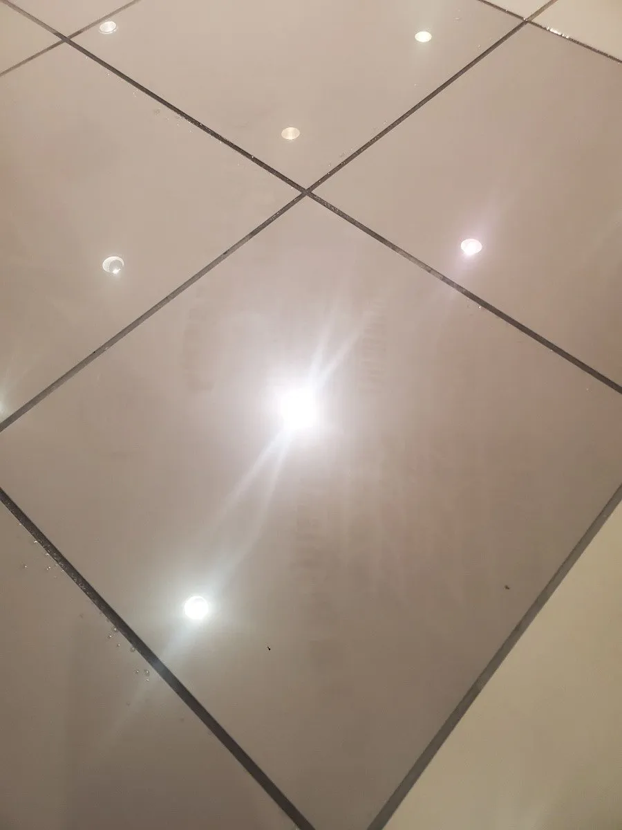Close view of polished commercial tile and clean grout lines in Dallas-Fort Worth